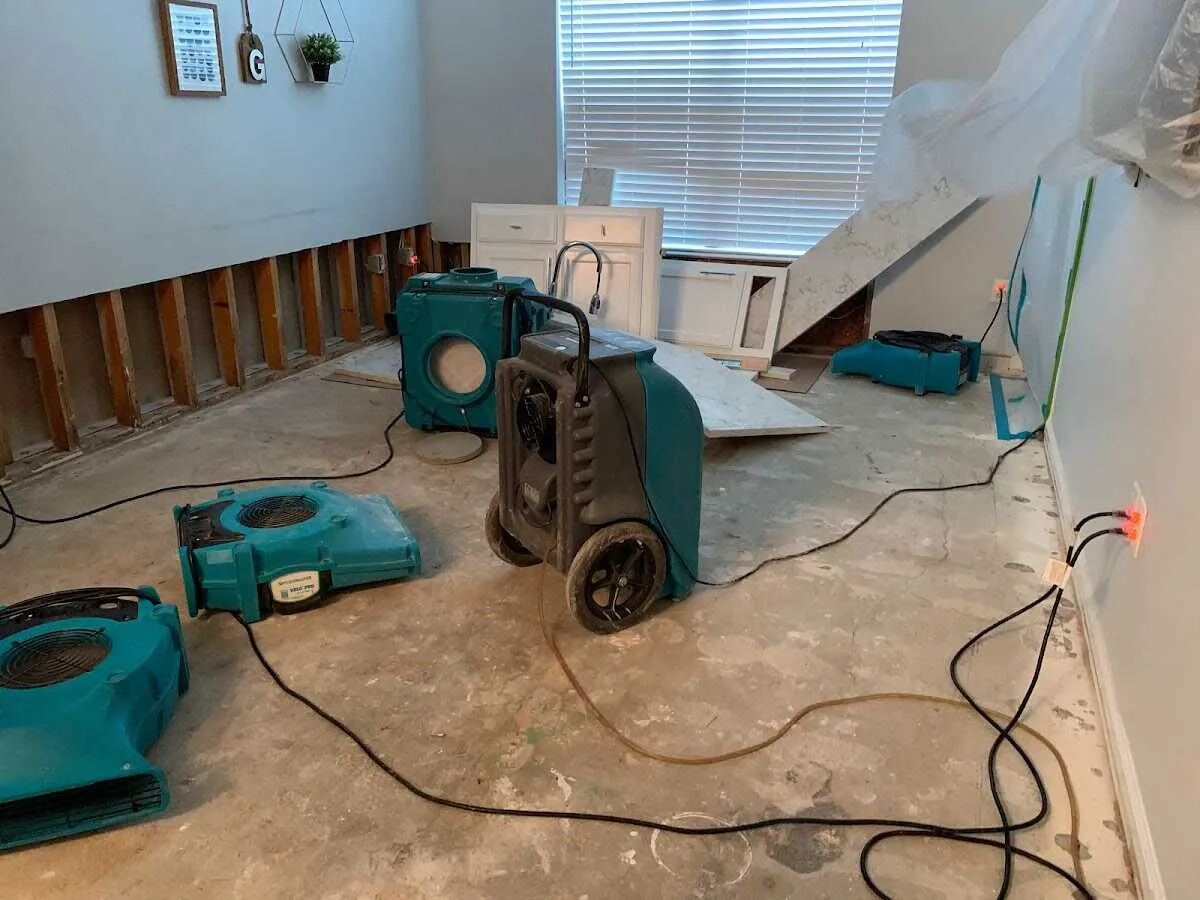 Dehumidifier in flood-cut room for Water Damage Restoration in Williston
